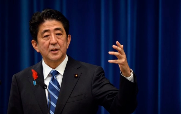 Shinzo Abe’s decision to increase Japan’s consumption tax from 5% to 8% next year is part of a plan to reassure investors the country’s debt is under control. EPA/Franck Robichon