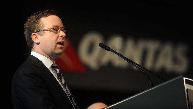 Qantas CEO Alan Joyce is under pressure, with the airline flagging a $300 million half-year loss. Alan Porritt/AAP